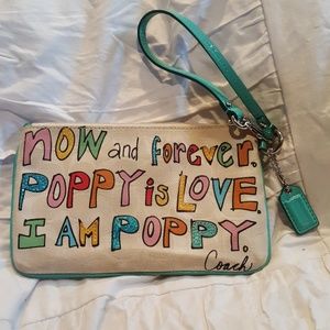 COACH - White "Poppy" wristlet